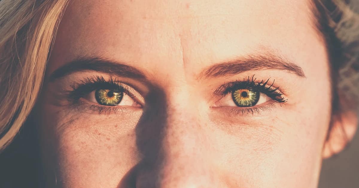woman piercing green eyes
